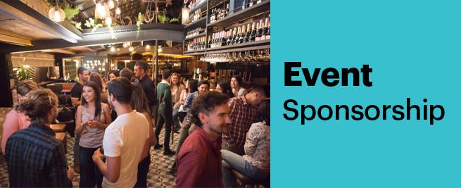 A lively social gathering at a stylish venue with people mingling, warm lighting, plants, and shelves of bottles. Text reads "Event Sponsorship."